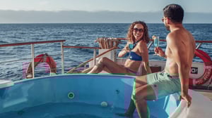 Couple at jacuzzi in coral II