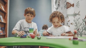 Children playing in the kids corner of the Galapagos Legend