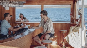 People at the Fishermans Bar in the Galapagos Legend