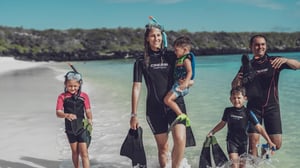 Go Galapagos - Family doing snorkelling