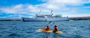 Kayaking at Genovesa Island, and the Galapagos Legend in the back