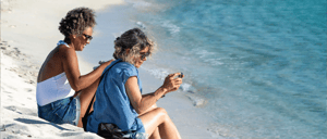 Santa Fe in Galapagos Island with Tourist on the beach