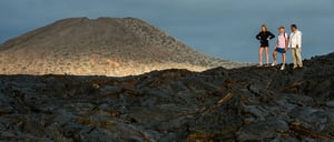 Sullivan bay, solid volcanic lava with tourist watching all
