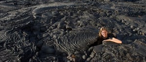 Sullivan bay, solid volcanic lava with tourist girl