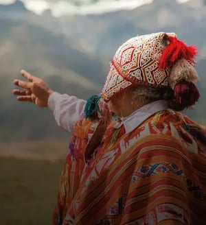 Ecuador Land tours: GO6 Package Ecuador, Galapagos Cruise & Peru: a boy showing a beautiful landscape of Peru